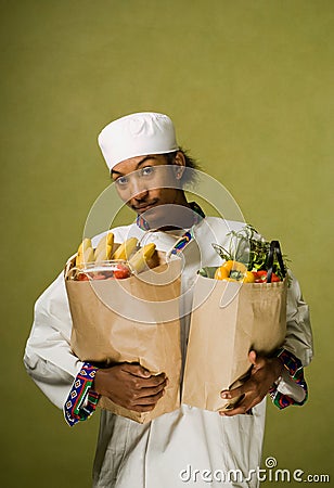 Young African American Chef Carrying Grocery Bags