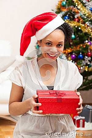 Young African American woman holding a gift box - Black people