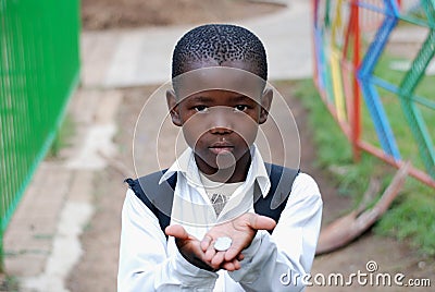 Young African School Boy Asking for money
