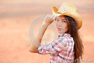 Young american cowgirl woman