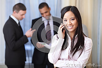 Young asian businesswoman on phone