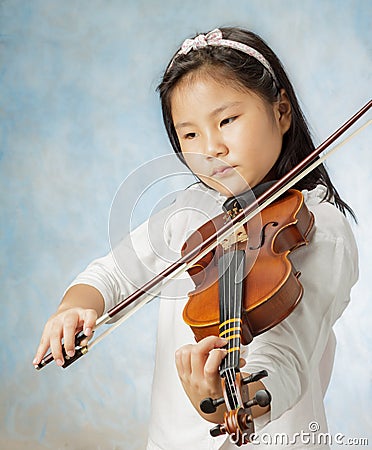 Young asian girl played violin