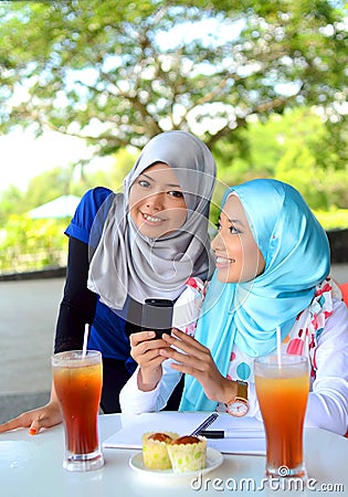 Young asian muslim woman in head scarf