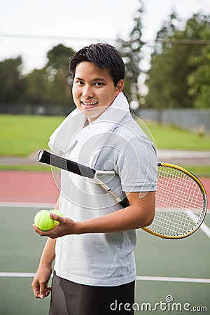 Young asian tennis player