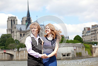 Young beautiful couple in Paris at walk