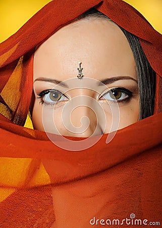 Young beautiful woman indian traditional eyes