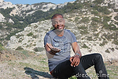 Young black man smiling, outdoor