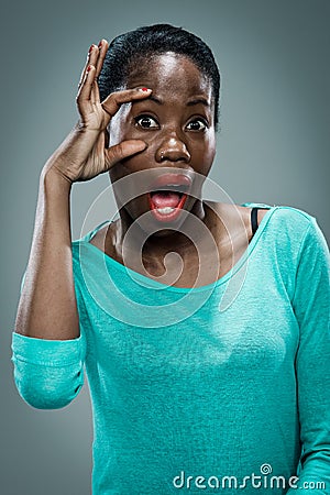 Young Black Woman with Surprise Expression