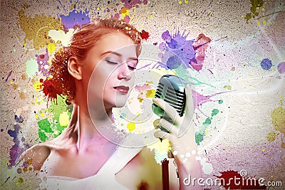 Young blonde female singer with microphone