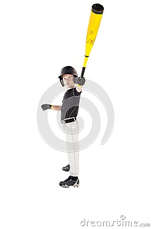 Young boy baseball player showing off with his bat extended