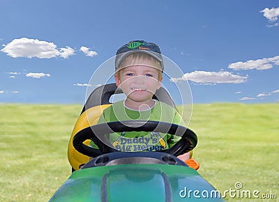 Young Boy on a Riding Mower