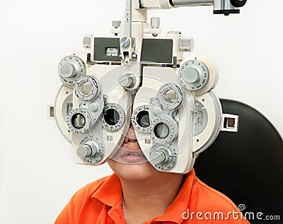 Young boy undergoing eye test