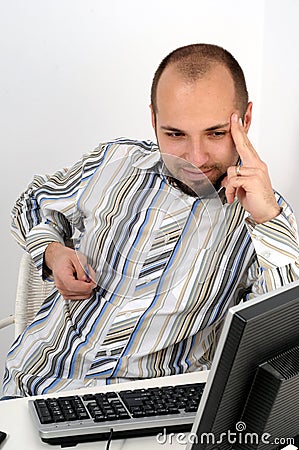 Young business man working on computer