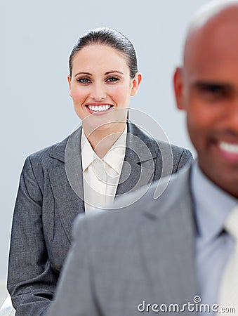 Young business people smiling