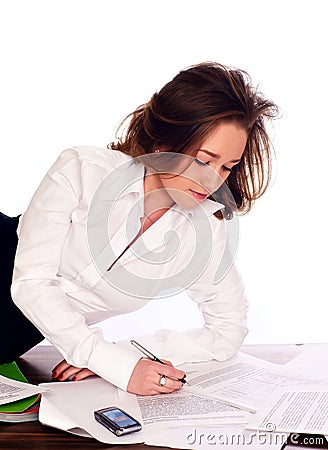 Young business woman signing a document