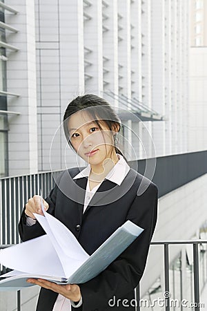 Young business women with file