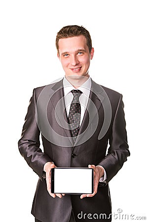 Young businessman showing a tablet pc comuter with blank screen for your sample text