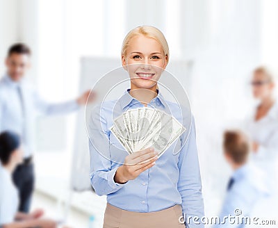Young businesswoman with dollar cash money