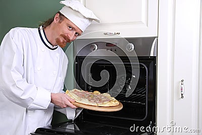 Young chef with italian pizza