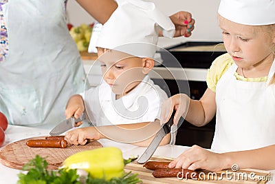 Young children learning to cook