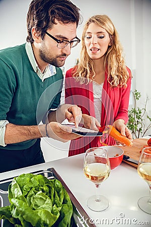 Young couple cooking together