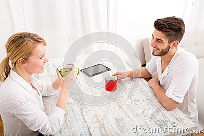 Young couple having a coffee break