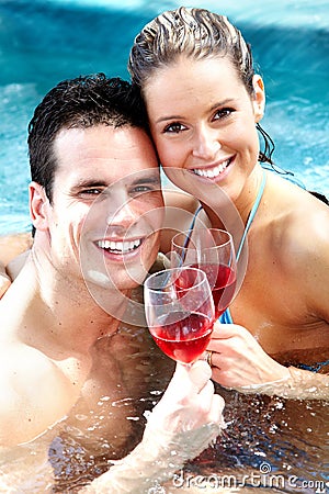 Young couple in jacuzzi.