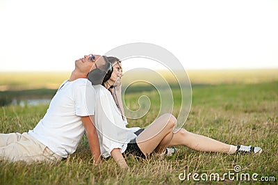 Young couple listening to music