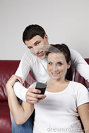 Young Couple with Mobile Phone