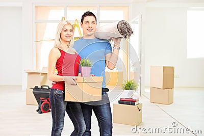 Young couple moving into a new apartment