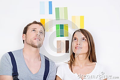 Young couple trying to decide on new decor