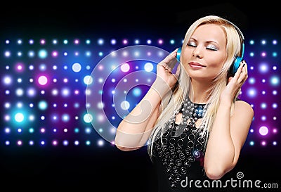 Young DJ Woman with Headphones. Happy Blonde Girl