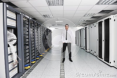 Young it engeneer in datacenter server room