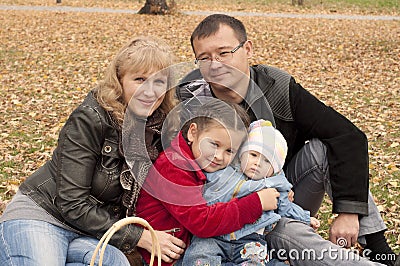 Young family in autumn park