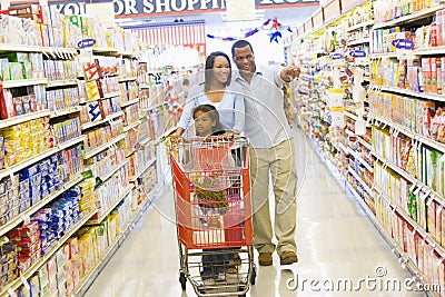 Young family grocery shopping