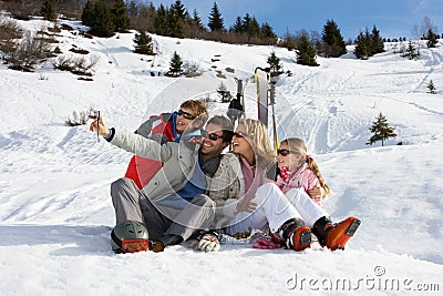 Young Family On Ski Vacation