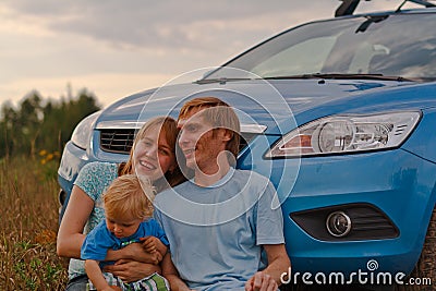 Young family travel by car