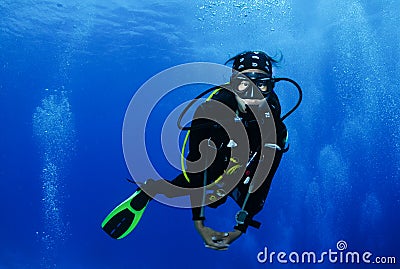 Young female Asian scuba diver