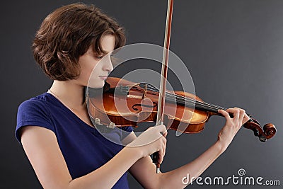 Young female playing the violin