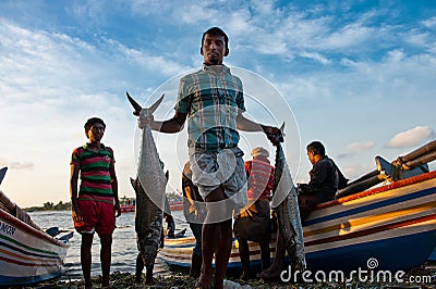 Young fisherman coming back from the sea