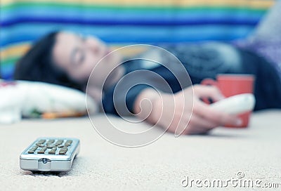 Young Girl On Floor Watching TV