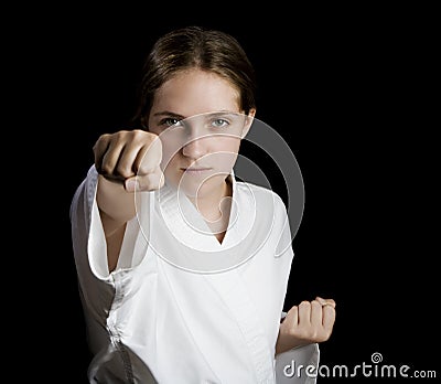 Young girl in a karate stance