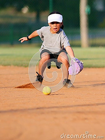 Young Girl Playing Softball