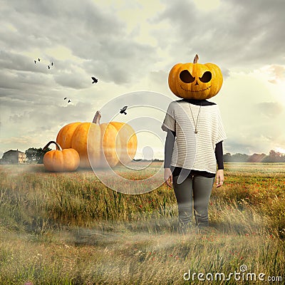 Young girl with pumpkin head, halloween