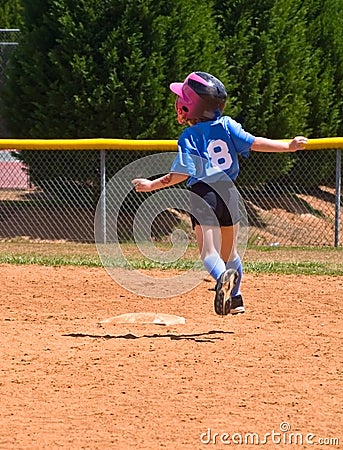 Young Girl Softball Player Running