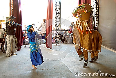 Young girl in traditional clothes costume dancing folklore Egyptian dancing