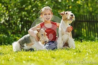 Young Girl and two fox terriers