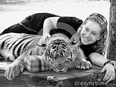 Young girl up close with Bengal tiger holiday Asia