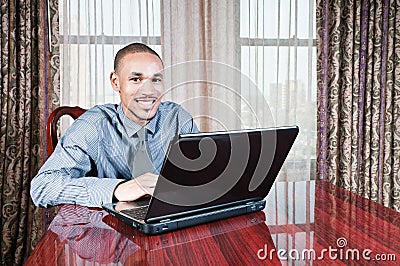 Young Handsome Man at Computer