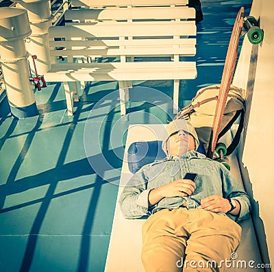 Young hipster man having a rest during world tour travel